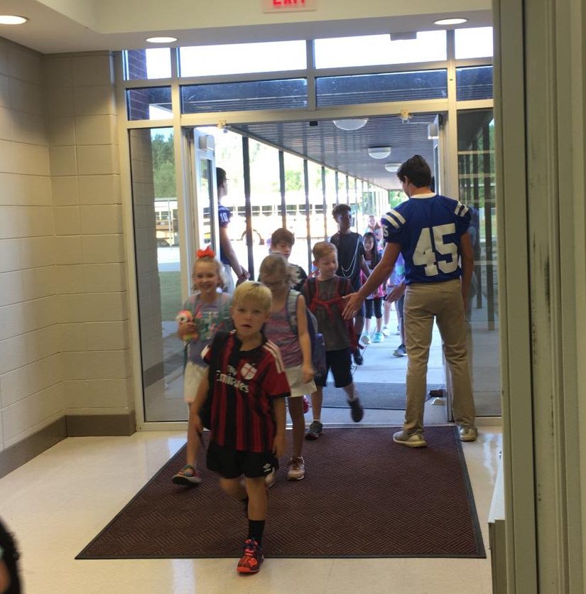 Hornets Players Cheerleaders Greet Elementary Students