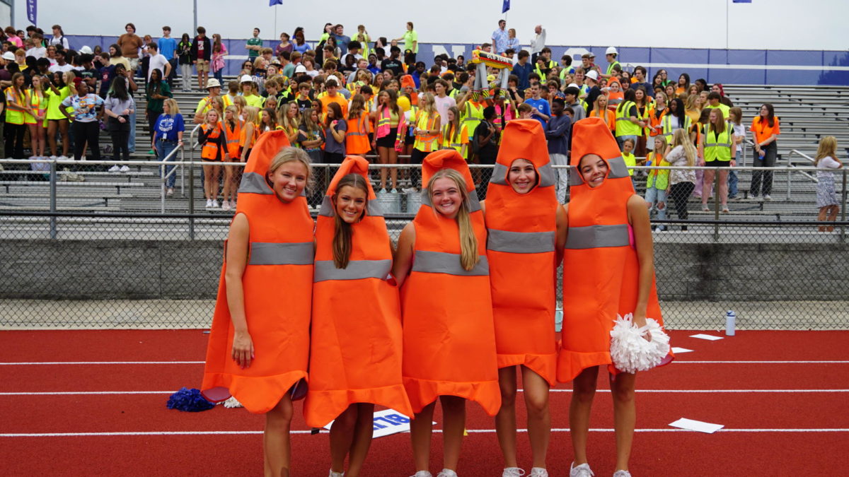 The cheerleaders dressed in cone costumes to match the theme of the game, Clear Out Calera.